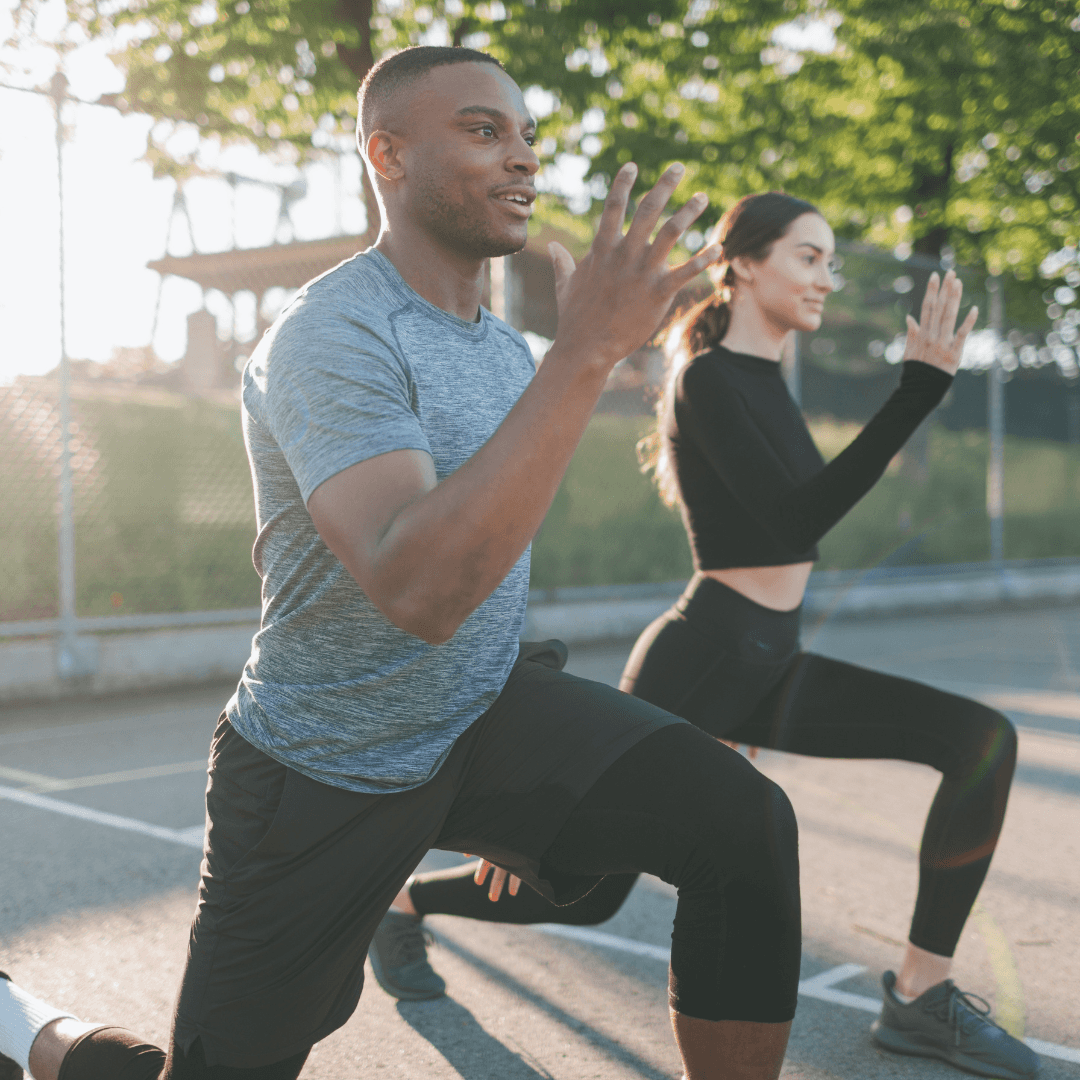 man and woman exercising
