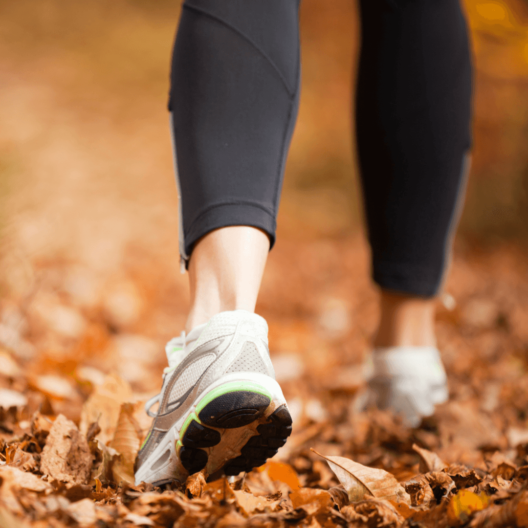 running shoes in on autumn leaves